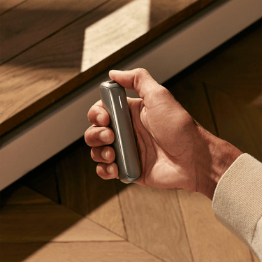 The sleek Ploom AURA Lunar Silver deviceis a discreet companion always with you