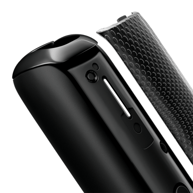 Close-up of Jet Black Augmented Pattern Ploom Aura front panel, detached from device