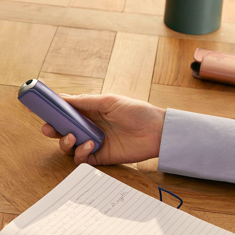 Hand showing Ploom AURA Back Cover Lavender accessory attached to device
